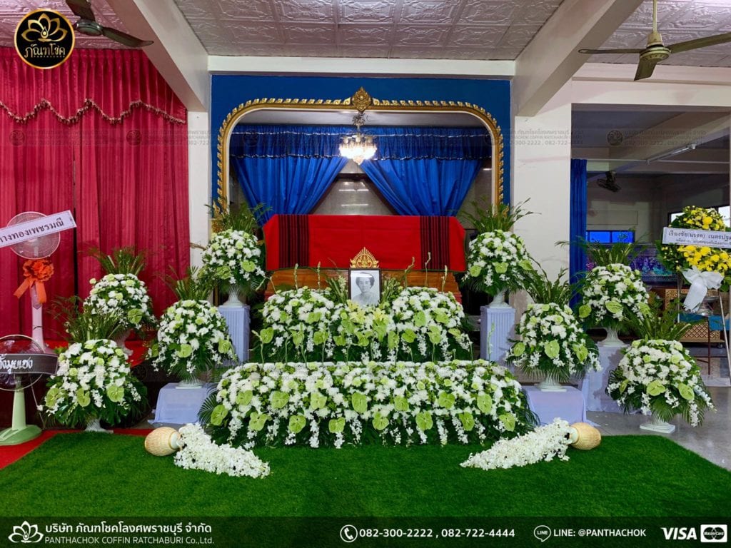 Flowers in front of the coffin